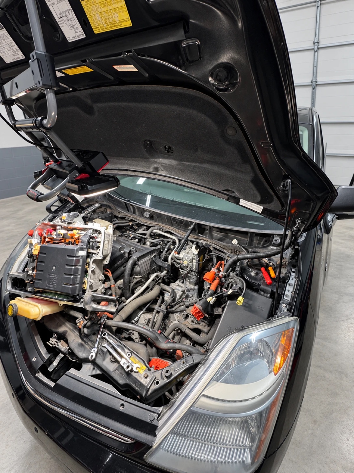 Prius engine bay with inverter exposed